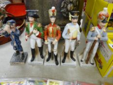 Four French officer figurines etc