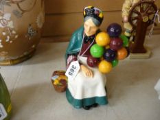A Royal Doulton pottery figurine 'The Old Balloon Seller' HN1315