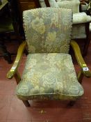 A re-upholstered vintage armchair