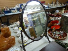 A delicate dressing table mirror