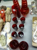 A quantity of mainly cranberry glassware