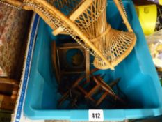 A tub containing miniature furniture items