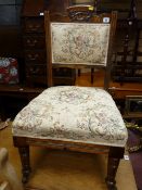 An Edwardian upholstered salon chair