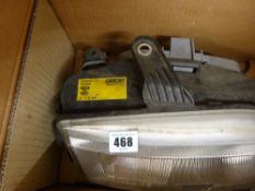 A boxed pair of Fiat headlamps, no. 46537111/2 or 38540999