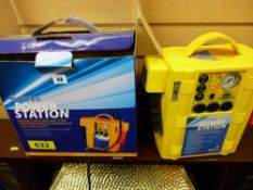 An Auto XS portable rechargeable jump starter