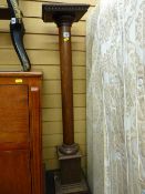 A European mahogany tall torchere stand