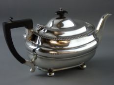 A HEAVY OVAL SILVER TEAPOT on four ball feet, 23 troy ozs gross, London 1927