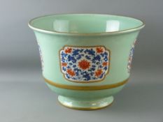 A LARGE CHINESE CELADON JARDINIERE with underglazed blue Qianlong seal mark, the upper and lower