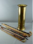 TEN VARIOUS RIDING CROPS, WALKING STICKS & CANES in a tubular brass stickstand