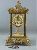 A 19th CENTURY FOUR PANE GILT BRASS MANTEL CLOCK, the dial with visible escapement set with Roman