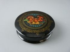 AN EARLY TO MID 20th CENTURY CIRCULAR LIDDED RUSSIAN LACQUERED BOX, the lid having a centre scene of
