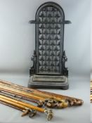 ELEVEN DOG'S HEAD WALKING STICKS & CANES, all carved and composition in a reproduction cast iron