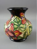 A MOORCROFT 'PALMATA' GLOBULAR SQUAT VASE, decorated on a black ground, impressed and painted