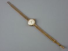 A LADY'S NINE CARAT GOLD CIRCULAR DIAL TUDOR ROYAL WRISTWATCH with nine carat gold dart bracelet, 16