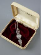 A 925 SILVER CIRCULAR DIAL COCKTAIL WATCH with marcasite decoration and with shaped and pierced