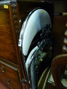 Chrome folding chair, wrought iron wall mirror and one other