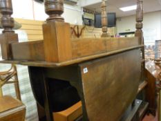 Antique mahogany drop leaf dining table and an Edwardian long table on turned supports