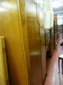 Good vintage oak two piece bedroom suite of two door wardrobe and mirrored dressing table