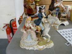 Continental figure of a gentleman on horseback with lady