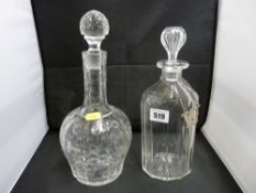 Two vintage glass decanters with stoppers, one with hallmarked silver chase decorated letter 'W'