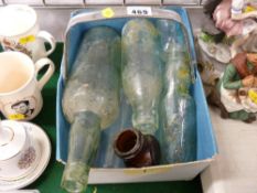 Basket of vintage glass bottles