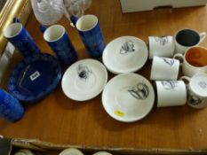 Six Susie Cooper 'Black Fruit' coffee cans and saucers and a quantity of Portmeirion 'Totem' ware