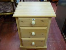 Modern pine three drawer bedside chest