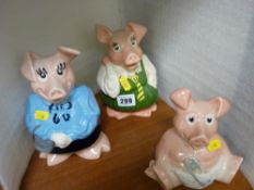 Three Nat West pigs