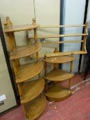Mid oak Ercol plate rack, a five tier and a three tier corner whatnot by the same manufacturer