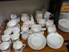 Parcel of Royal Doulton 'Autumn Glory' teaware and 'Hedge Rose' pottery breakfast ware and a shoe