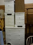 Modern white melamine bedroom set of six drawer chest, two matching three drawer bedside chests,