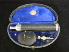 Cased ophthalmoscope by Alexander & Fowler