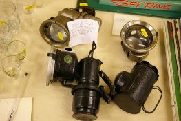 Two vintage Joseph Lucas bicycle lamps, spare headlamp and a vintage hand held Bullseye paraffin