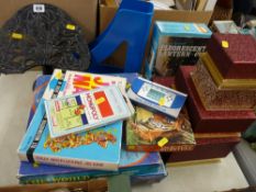 Cast iron bookstand, set of four stylish gift boxes, quantity of vintage jigsaws etc