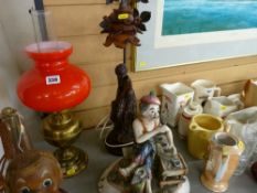 Resin based table lamp and a Capodimonte figure