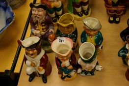 Six medium sized Toby jugs