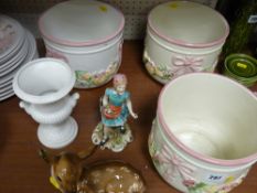 Three ribbon decorated pottery planters, an Italian figurine of a little girl, small vase and figure
