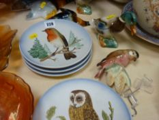 Five circular Goebel bird plates and a parcel of ducks and a parrot etc