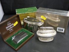 Silver cigarette box, boxed vintage savings bank, boxed Ronson lighter and one other