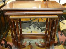 Reproduction set of three mahogany tables and an antique tripod table with circular top