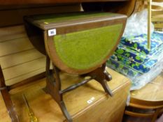 Leather topped drop flap occasional table and a gilt framed wall mirror