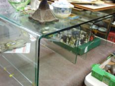 Nest of three designer glass tables