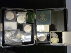 Oriental lacquerwork box containing a quantity of coins and commemorative crowns