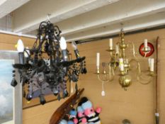 Reproduction black glass five branch chandelier and a brass French style nine branch example