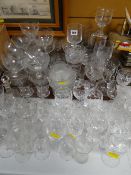 A quantity of various drinking glasses