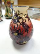 A Moorcroft squat baluster vase in the Pasque Flower, dated 2000 by Phillip Gibson