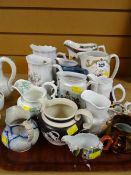 A quantity of mixed jugs including souvenir jugs, copper lustre etc