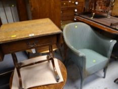 A small drop flap table with single drawer together with a Lloyd Loom armchair