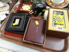 A boxed wooden carved chess set, a boxed game of Bezique etc