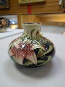 A Moorcroft squat vase in the Lilies of the Field pattern, one of only two shapes for this design by